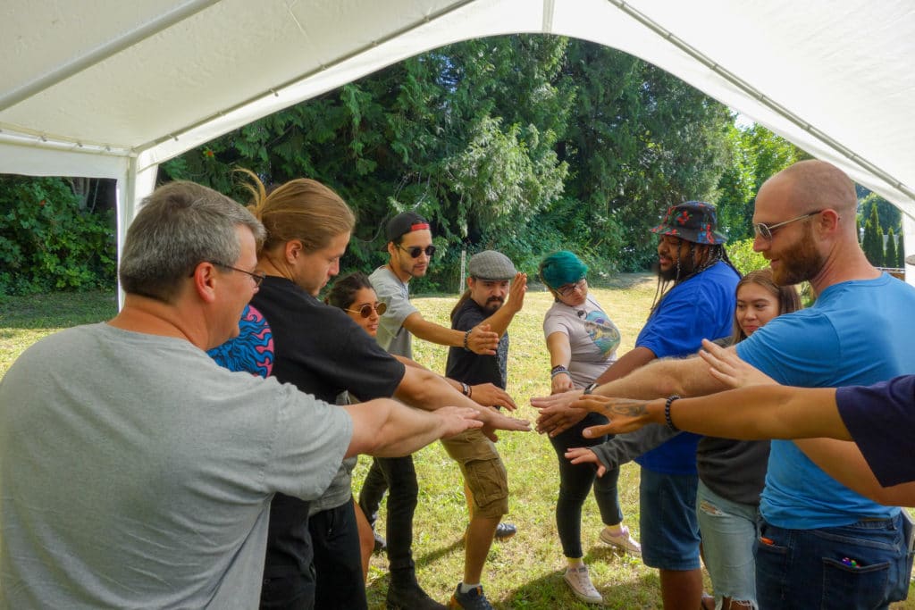 WAYK participants and the Sḵwx̱wú7mesh language team prepare for an energizer during the 2020 Summer Language Intensive in North Vancouver, British Columbia.