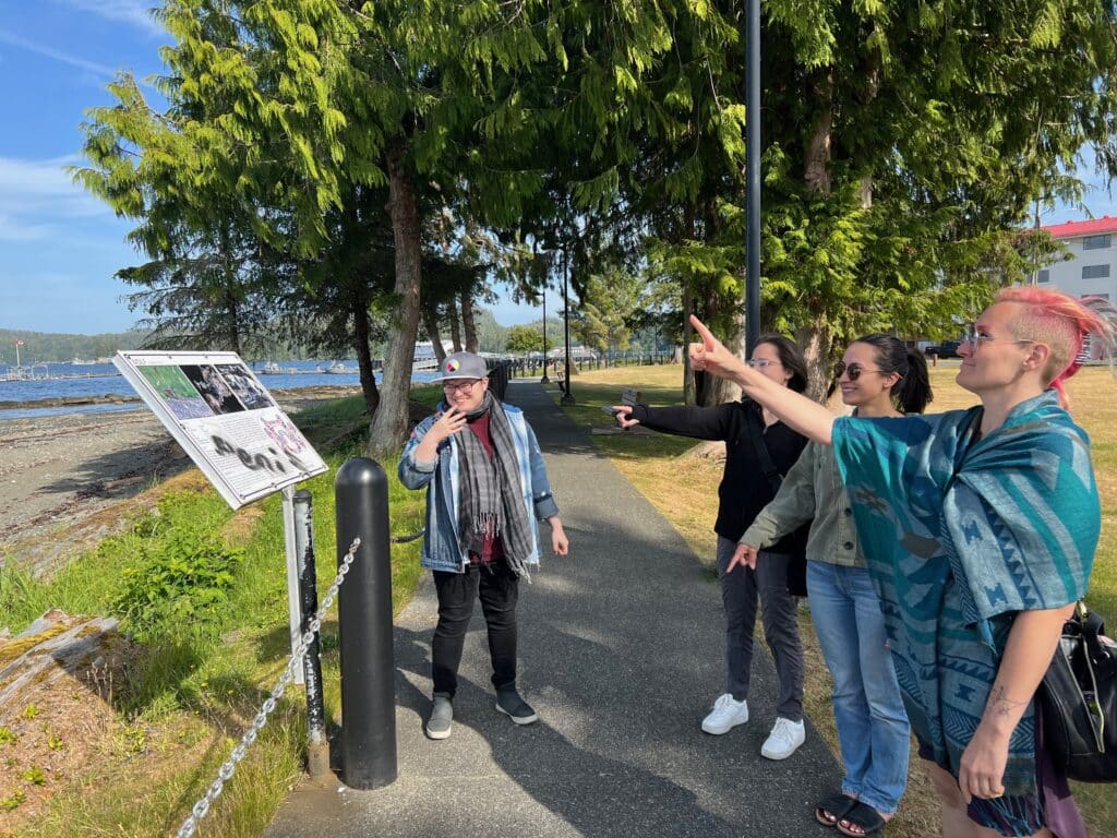 Kai, Michayla, Arynn, and Alicia on a Bak̕wa̱mk̓ala immersion walk at Carrot Park in Port Hardy, BC.